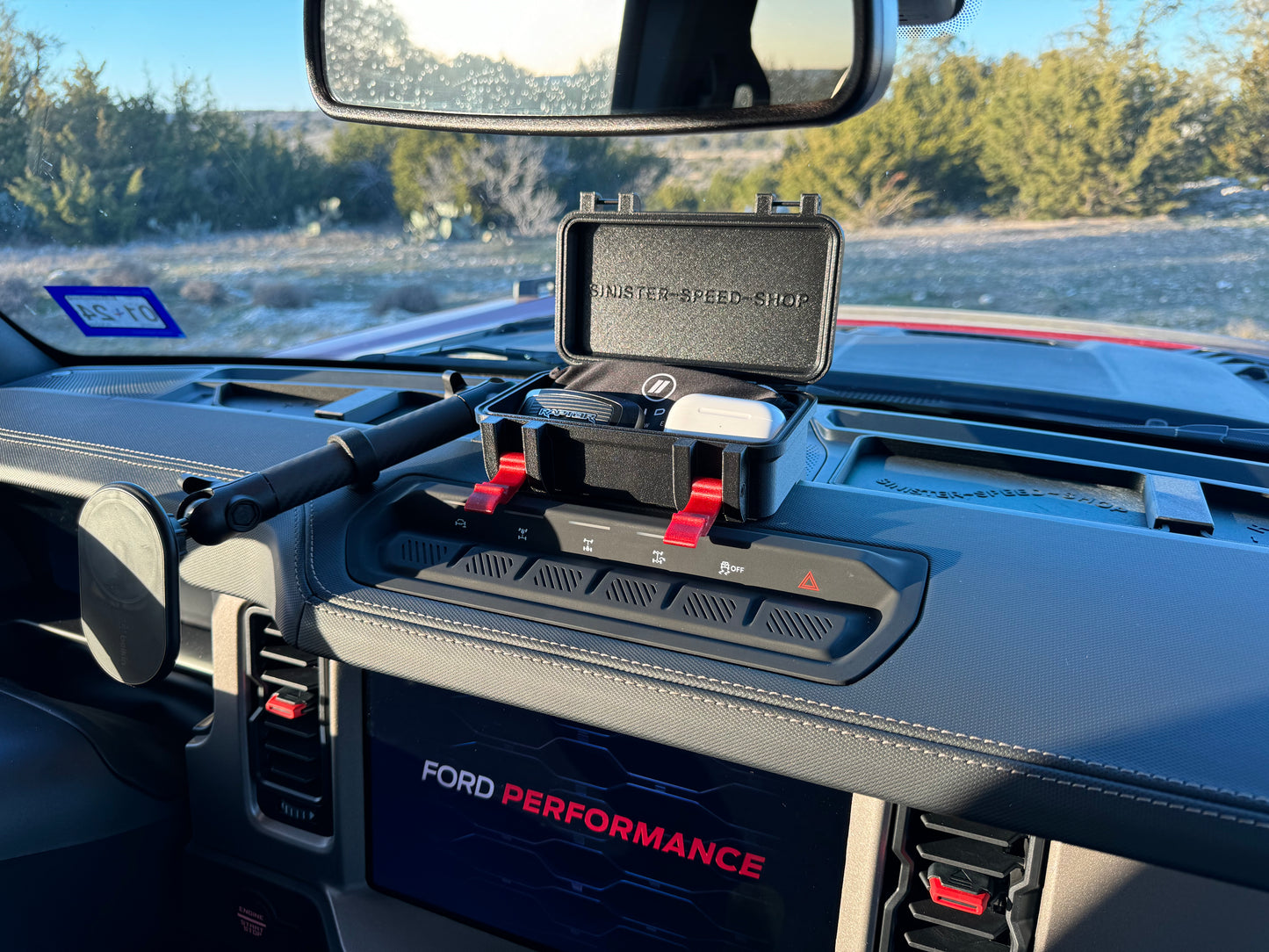 Personal storage caddy for Ford Bronco dash.